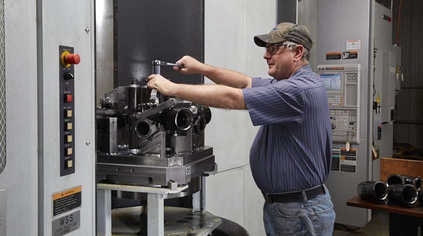 A member of our machining team at work.